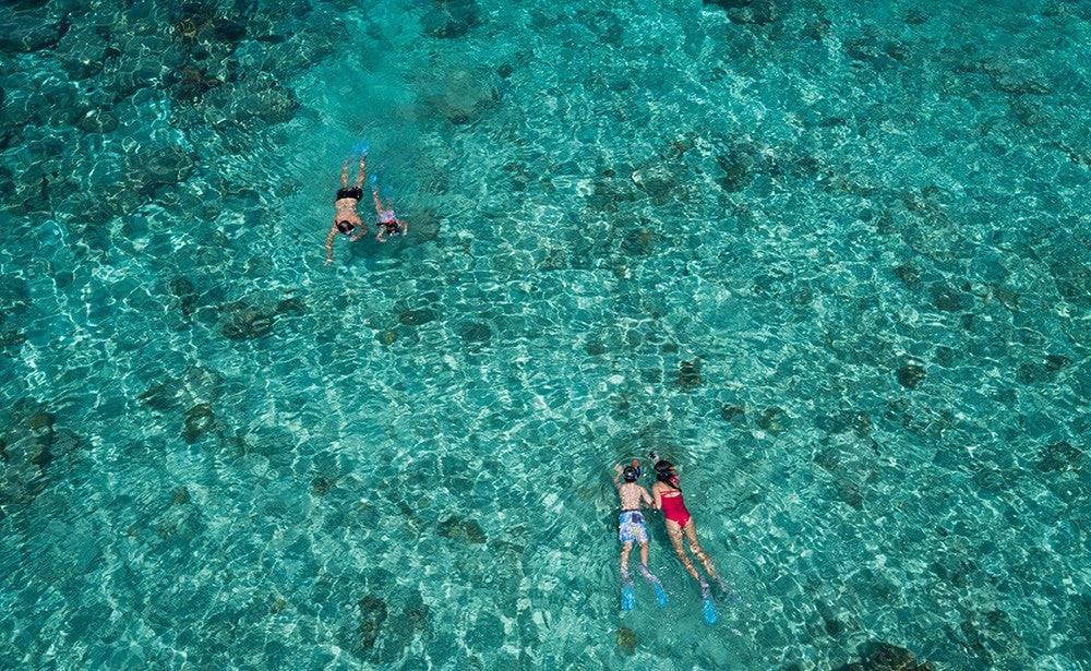 Swing your hand together. Anantara Dhigu Maldives