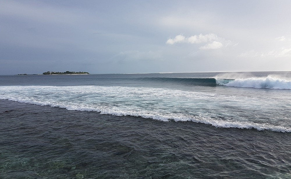 Beach landing waves. Anantara Veli, Maldives, Luxury Surfing