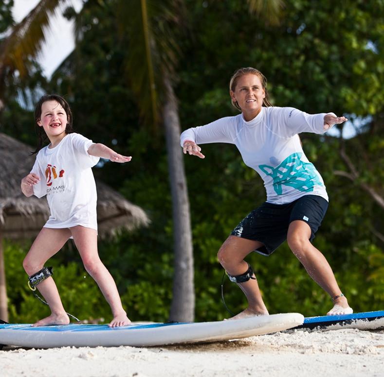 Kids Develop, Learn How to Surf Better