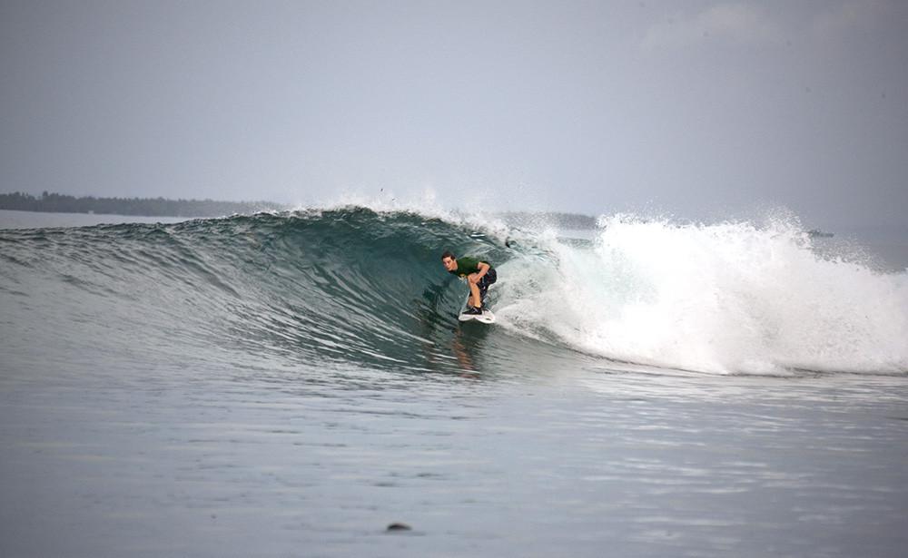 Ride the Waves. Secret Papua surfing holiday.