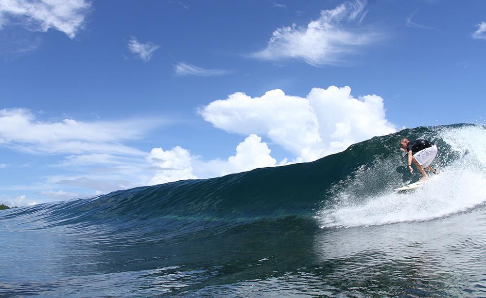 Waves Blockchain. Secret Papua surfing holiday.
